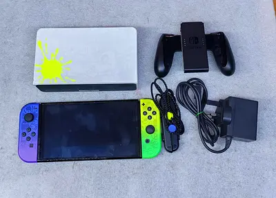 Nintendo Switch OLED with Splatoon Joy-Cons, dock and accessories - used