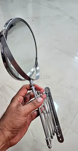 Wall-mounted extendable round vanity mirror - stainless steel