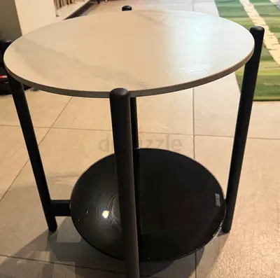 Round two-tier side table with black frame and white top