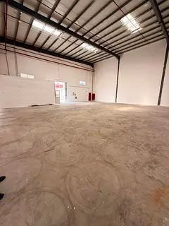 Warehouse for Rent | Office &amp; Internal Bathroom | 25 KW Power Supply | Prime Location in Umm Al 