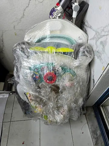 Folding baby walker in good condition - compact for storage