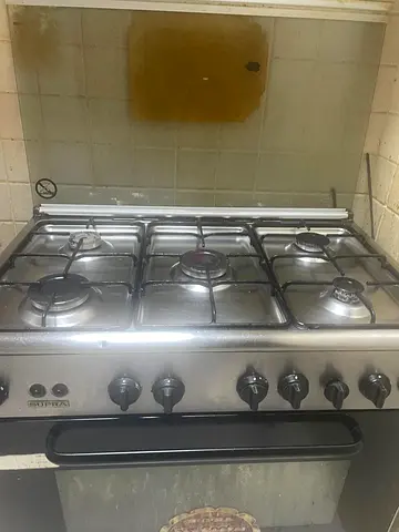 بوتجاز/غاز إيطالي خمس عيون و فرن في حاله جيده مع سلندر الغاز