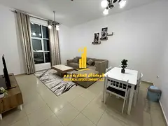 Luxury apartment, second occupancy, two bedrooms, living room, and open balcony. Ajman City Tower. F