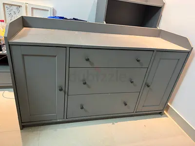 Gray wooden dresser / chest of drawers with side cabinets