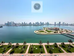 Four bedroom apartment with living room for annual rent in Al Majaz 3 Sharjah free air conditioning