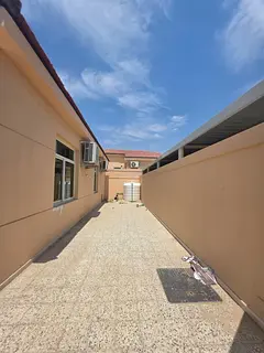 Private Two Bedroom Villa with Spacious Yard in a Peaceful Residential Community at Al Salamah