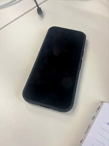 Used Apple iPhone in Black Protective Case