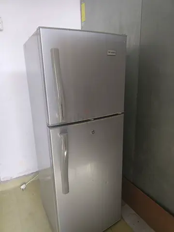 Used double-door refrigerator in good working condition
