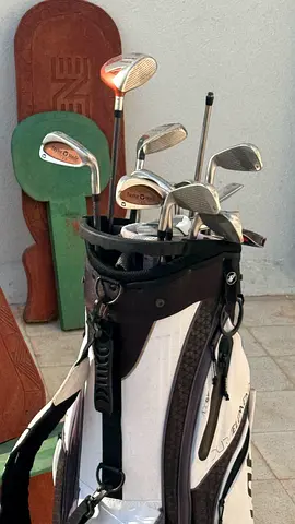 Used set of golf clubs with stand bag - good condition