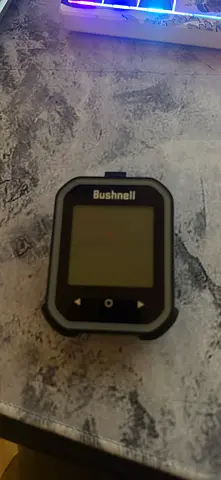 Bushnell digital device (likely rangefinder/step counter) - good working condition