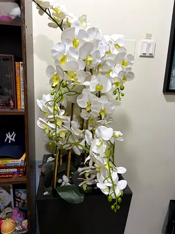 Tall artificial white orchid arrangement in rectangular planter