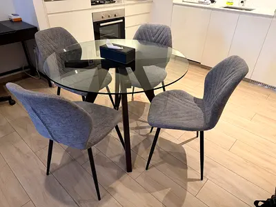 Glass dining table with chairs