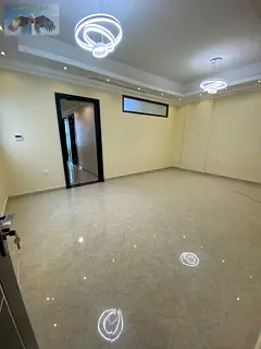 A three-room apartment and a living room for annual rent in Al Rawda Ajman spacious areas elegant de