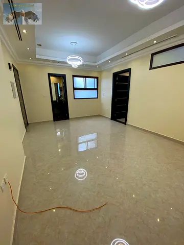 Three-bedroom apartment with a living room for annual rent in Al Rawda Ajman Spacious and elegantly designed close to amenities and with easy access