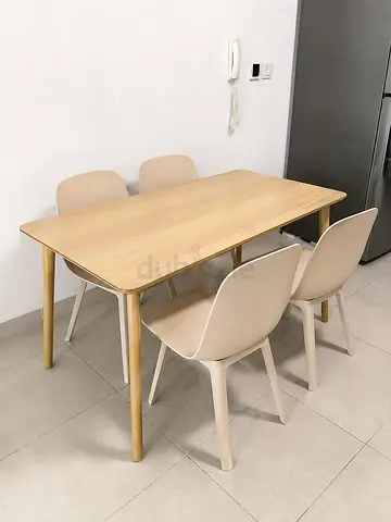 Light wood dining table with 4 beige chairs - good condition