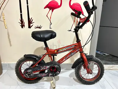 Childrens 12 Red and Blue Cycles - Good Condition