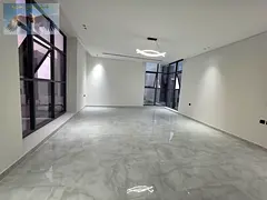 Luxury villa for annual rent in Al Helio 2, Ajman, corner location on two streets, with swimming poo