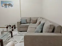 For monthly rent in Al Rawda 3 Ajman a fully furnished 3bedroom apartment with a living room and a f