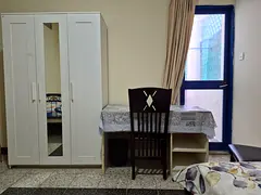 Fully furnished Room with Balcony available for rent in a 2BHK Flat on Old Airport Road, Al Mushrif