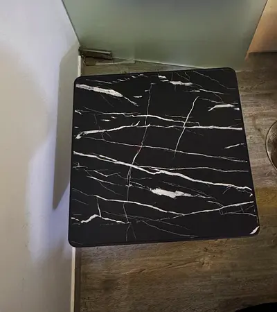 Black marble-effect square side table - good condition