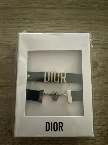 Christian Dior bracelet leather and silver with bag.