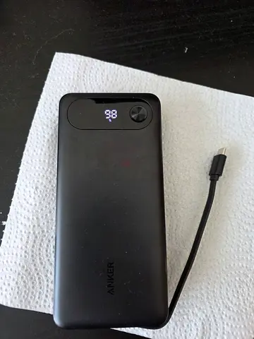 87W 20,000 mAh Anker power bank with two ports and built in USB-C cable