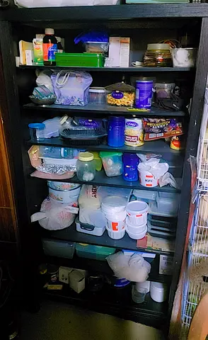 Dark wood storage cabinet with 6 shelves - used pantry/storage unit