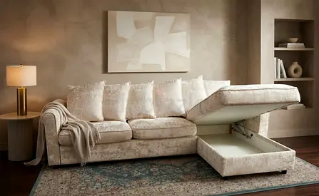 Modern L Shape Sofa Bed with spacious storage compartment and luxurious cream upholstery. Perfect fo
