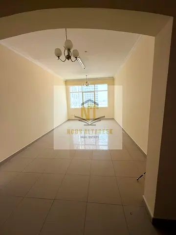 For rent in Al Khan: a master bedroom and a living room. The unit comprises a bedroom, two bathrooms, a kitchen, and a living room. The price is 36,00