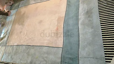 Light beige and grey modern area rug - decent condition
