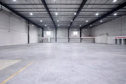 36000 sqft warehouse UAQ 10000 sqft yard 550KW AED 1.2M ready use massive industrial site