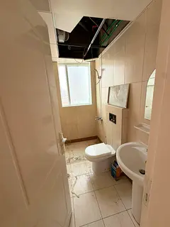 Annual rent in Al Khan near Nesto Three bedroom apartment with living room 3 bathrooms Maid room Bui