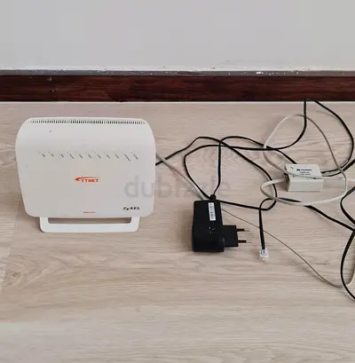 ZyXEL TTNET ADSL Modem Router with Power Adapter and Phone Line
