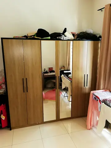 6-door wooden wardrobe with mirrored center panels - good condition