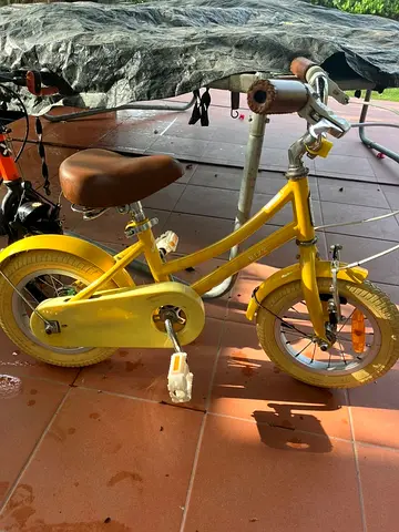 Yellow childrens bike - 12 inch, good working condition
