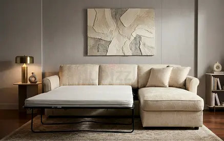 Beautiful Cream L Shape Sofa Bed with premium fabric, spacious storage, and supportive mattress. Per