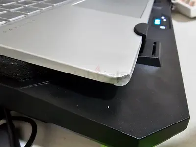 Lightly used laptop with dented corner - works fine