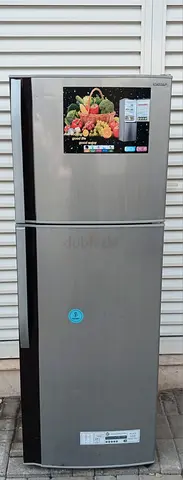 Double Door 322 liters SHARP Refrigerator Freezer, silver color, condition is cooling perfectly.