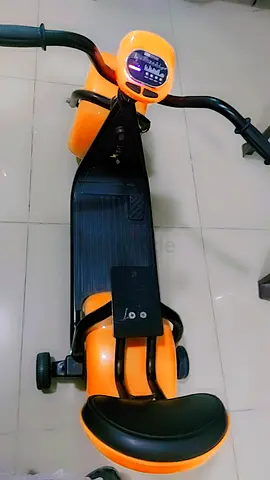 Music car ...Kids Electric Ride-On Scooter/Trike in Orange - Good Working Condition