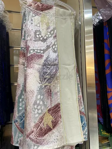 Pair of patterned fabric curtains - light beige with leaf design