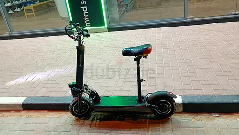 Used electric scooter with seat - good working condition