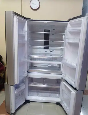 Spacious Stainless Steel 4-Door Refrigerator – Good Condition