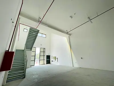 The warehouse is located on a main street within Al Jurf Industrial Area 3—one of the most active and vibrant industrial zones—and benefits from easy