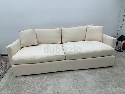 Still brand new cratebarrel three seater sofa