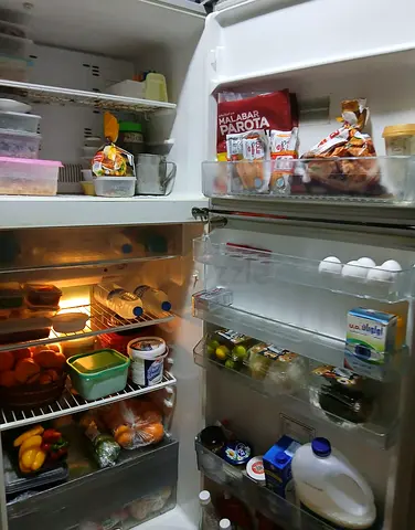 Used double-door refrigerator - working condition, comes with shelves