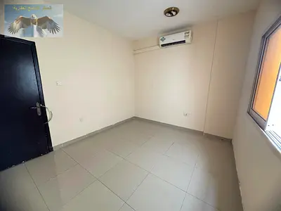 Two bedroom apartment with living room at a great price prime location on Dubai and Sharjah exit with flexible payment options.