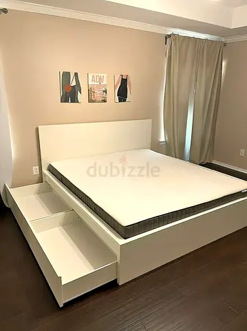 Ikea King White Malm bed frame with an Ikea mattress (180x200cm)