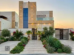 Own your dream villa Modern design with a roof , registration fees included . Close to the mosque an