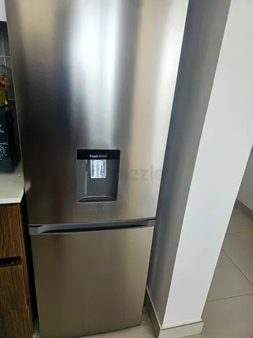 Stainless Steel Bottom-Freezer Refrigerator with Water Dispenser - Good Condition