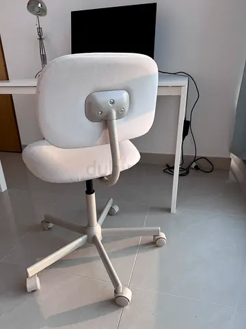 Beige swivel office chair with fabric upholstery, good condition